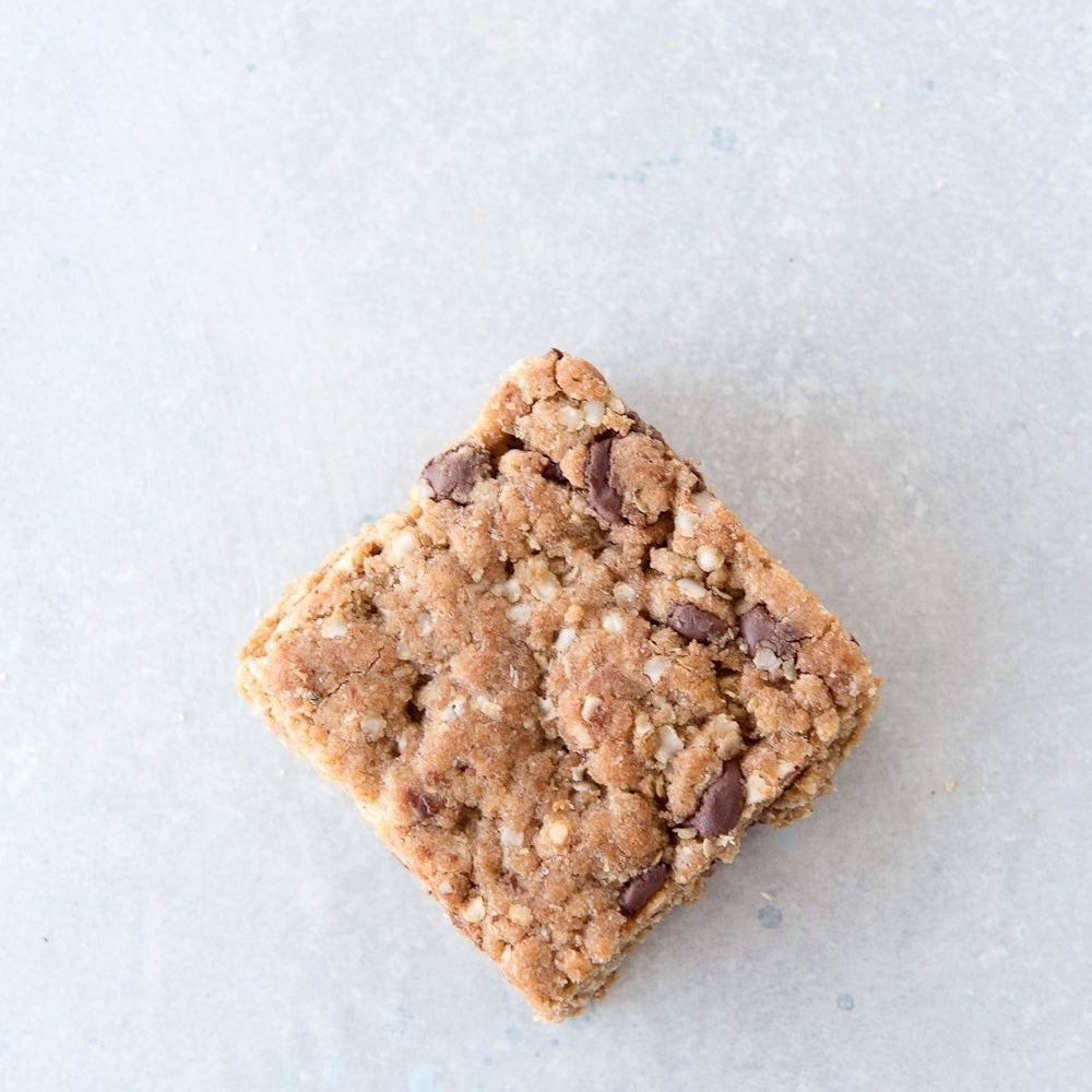 
                      
                        top view single gluten free vegan chocolate chip cookie bar
                      
                    