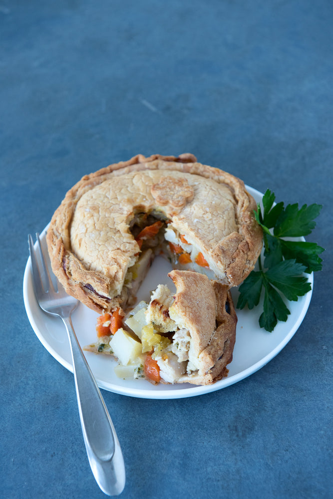 
                  
                    Load image into Gallery viewer, gluten free chicken pot pie on a plate with a fork &amp;amp; parsley
                  
                