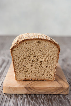 
                  
                    Load image into Gallery viewer, cut face view gluten free Oat Bread on wood board, egg-free
                  
                