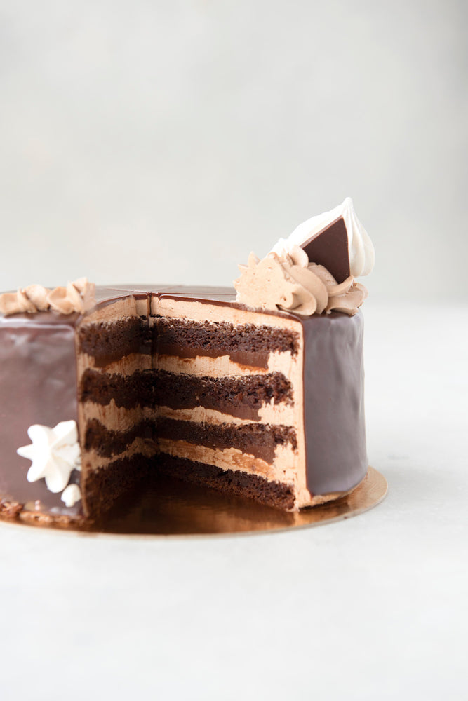 
                  
                    Load image into Gallery viewer, cut inside view gluten free triple chocolate cake with ganache and chocolate buttercream
                  
                