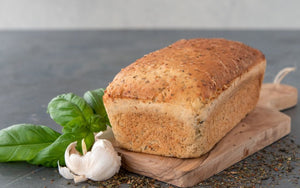 
                  
                    Load image into Gallery viewer, whole loaf gluten free herb and garlic Vega bread
                  
                